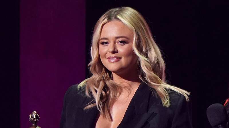 Emily Atack almost suffers BRITs wardrobe mishap as she makes 