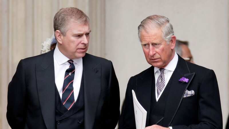 Prince Andrew with his brother Charles at a service in 2012 (Image: Getty Images)