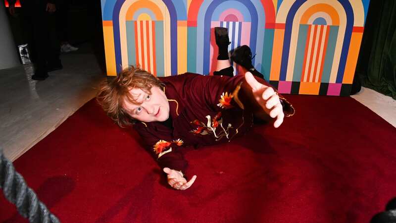 Lewis Capaldi rolls around the carpet at wild afterparty after chaotic BRITs