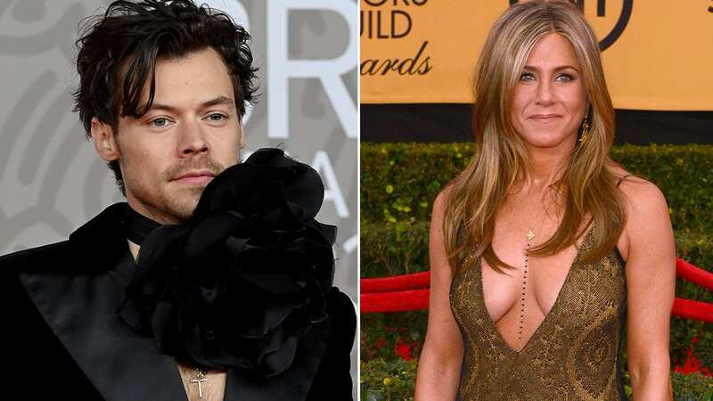 Jennifer Aniston and Harry Styles exchanging 