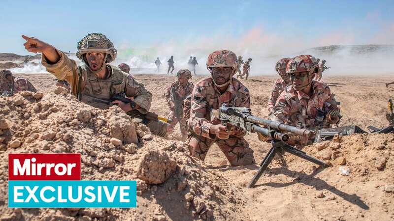 Royal Anglian troops stage a mock assault on an enemy urban area on Exercise Khanjar in Oman (Image: Andy Stenning/Daily Mirror)