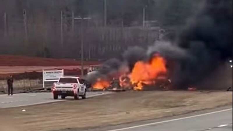 Two people have died after a Blackhawk helicopter crashed into a highway (Image: Facebook)