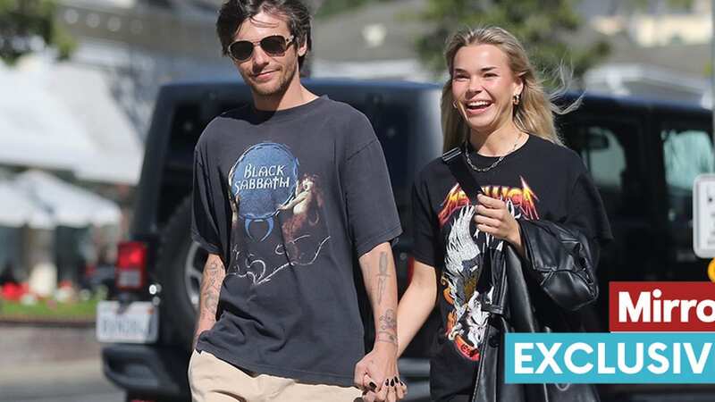 Louis Tomlinson holds hands with mystery blonde months after split from ex