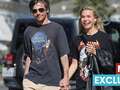 Louis Tomlinson holds hands with mystery blonde months after split from ex eiqrriezixdinv