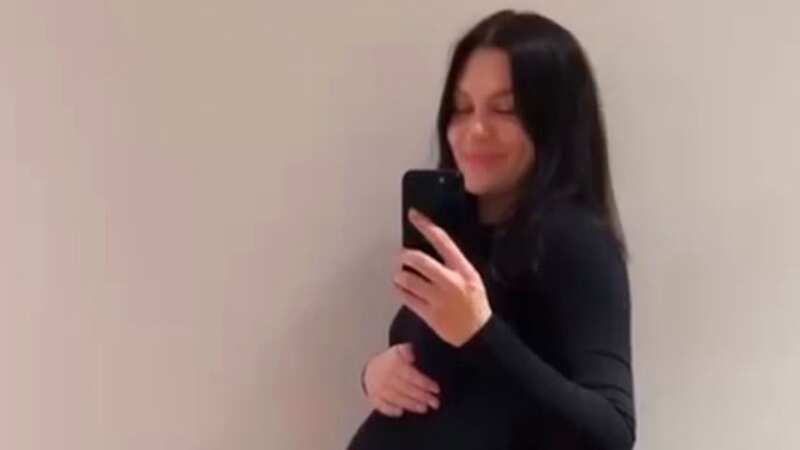 Pregnant Jessie J shows of blossoming baby bump in figure-hugging dress