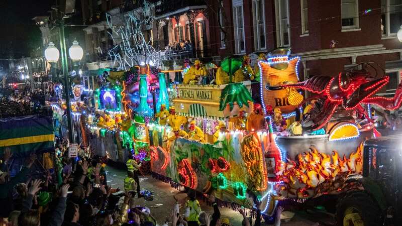 Krewe of Bacchus Parade before the shooting erupted (Image: Amy Harris/Invision/AP/REX/Shutterstock)