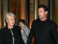 Hugh Jackman and wife Deborra-Lee hold hands as they enjoy night out in Paris