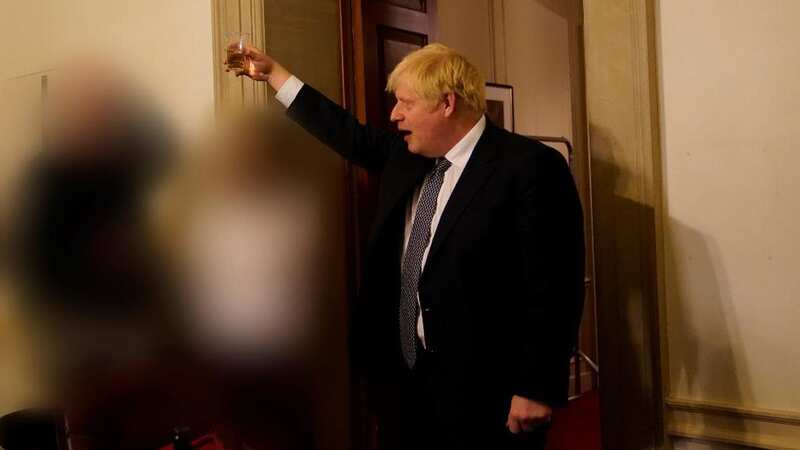 Boris Johnson at a gathering in Downing Street in November 2020, when restrictions were in place (Image: PA)