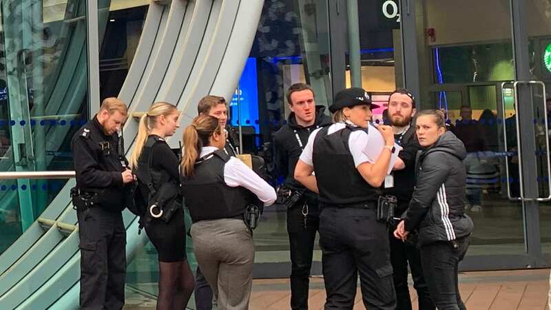 Police officers outside the O2 Arena in Greenwich after a teenager was stabbed earlier today (Image: George Cracknell Wright)