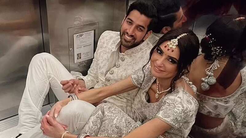 Newlyweds miss their own wedding reception after getting trapped in hotel lift