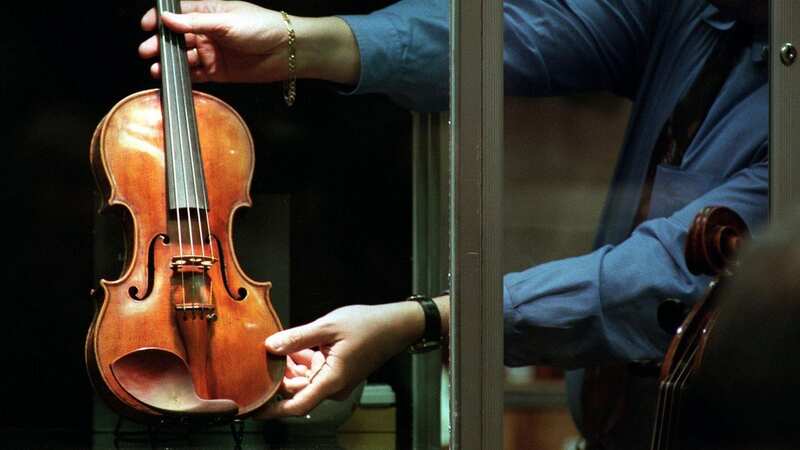 Janusz Wawrowski would not be separated from his Stradivarius (stock photo) (Image: AFP)