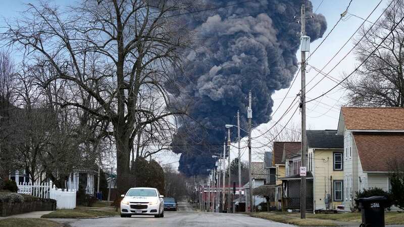 A black plume rises over East Palestine, Ohio, following the crash (Image: Gene J Puskar/AP/REX/Shutterstock)