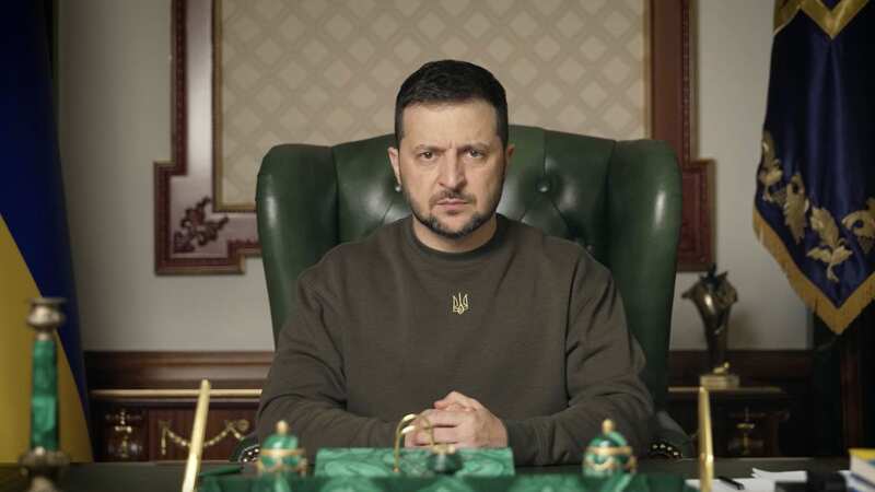 Hero Volodymyr Zelensky behind Ukraine