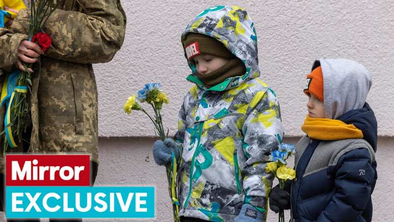 A memorial plaque is unveiled in the town of Irpin in honour of Igor Suhyh, a Ukrainian soldier who died defending his country (Image: Rowan Griffiths / Daily Mirror)