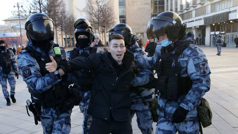 Protester is hauled away in Moscow as critics are silenced (Image: Getty Images)