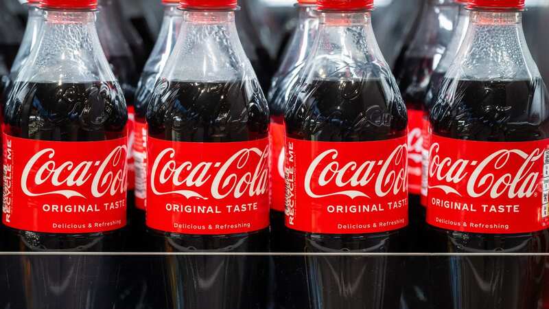 Scientists have found drinking Coca-Cola could increase testosterone size (Image: Getty Images)
