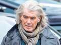 James Bond star is unrecognisable with long grey hair on film set