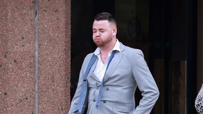 Darren More, 31, leaving court after his wife was jailed (Image: Liverpool Echo)