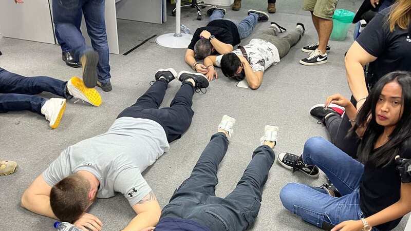 Floored: arrested suspects made to lie down (Image: IFW Global)