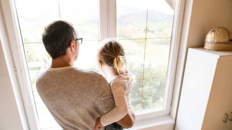 The man and his wife are going to adopt the little girl (stock photo) (Image: Getty Images/iStockphoto)