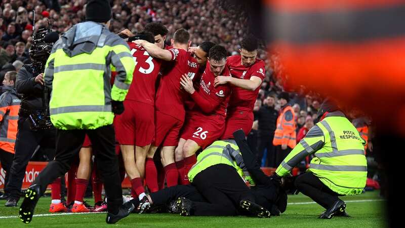 Jurgen Klopp furious as Liverpool fan runs onto pitch and injures Andy Robertson