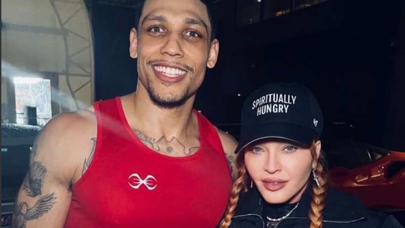 Madonna shows off her youthful looks as she watches 