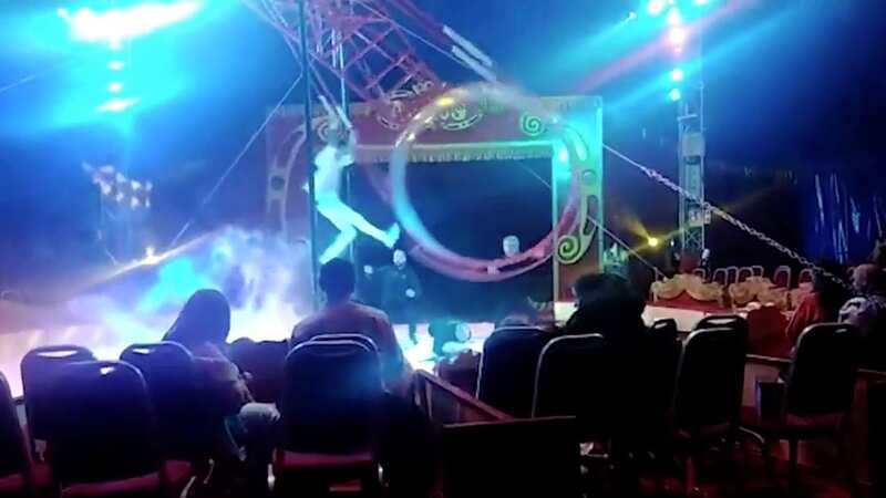 Terrifying moment trapeze artist plunges 30ft in Wheel of Death horror