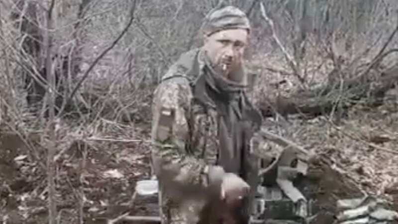 Unarmed Ukrainian war prisoner smoking cigarette shot dead by Russian soldiers