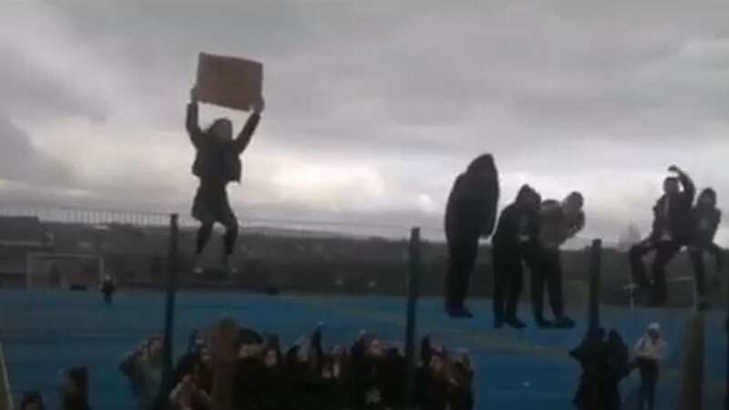 Some students scaled playground fences during the protest (Image: Derby Telegraph)