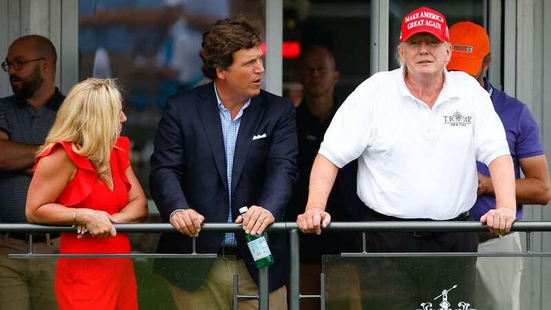 Former President Donald Trump, right, and Tucker Carlson (Image: Icon Sportswire via Getty Images)