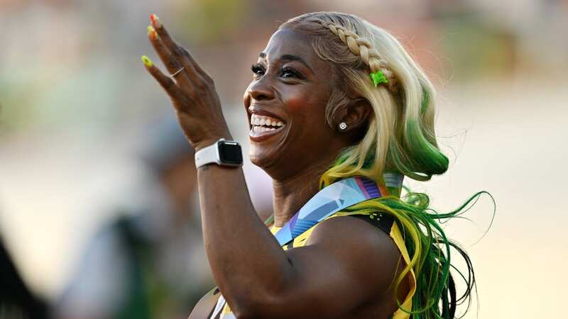 Shelly-Ann Fraser-Pryce celebrates after the women