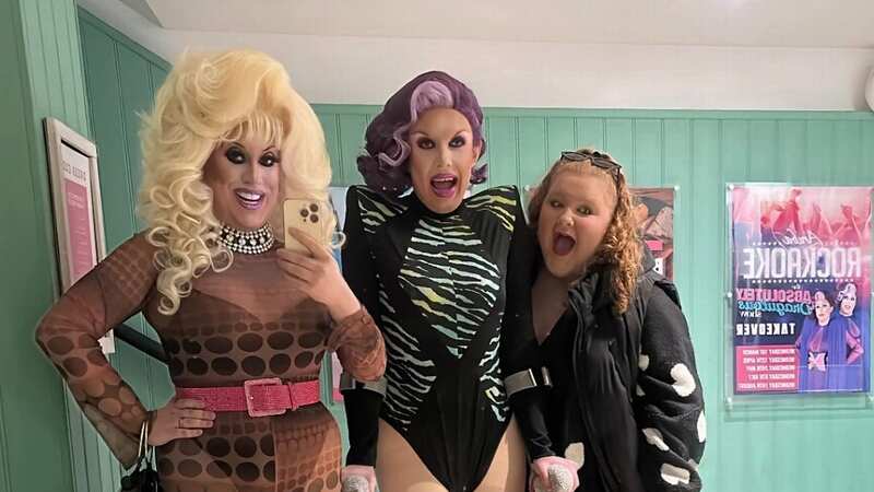 The couple, who are drag queens and pictured here with a fan, had been out enjoying a meal and a drink on the evening they had been attacked (Image: George Sullovan)