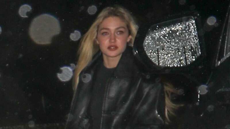 Gigi Hadid keeps it casual as she steps out of a pre-Oscar party where she and Leonardo DiCaprio were seen together, adding fuel to the dating rumors (Image: The Daily Stardust / BACKGRID)