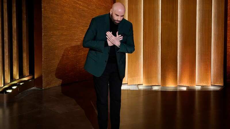 Heartbroken John Travolta breaks down in tears during Memoriam segment at Oscars
