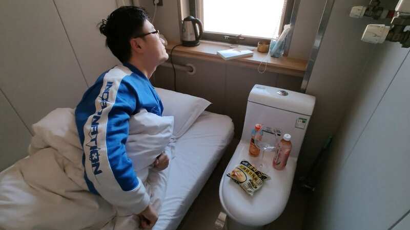 The toilet doubles up as a bedside table (Image: AsiaWire)