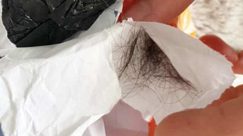 A stunned Depop shopper found a mysterious hairball inside their parcel (Image: Jam Press)