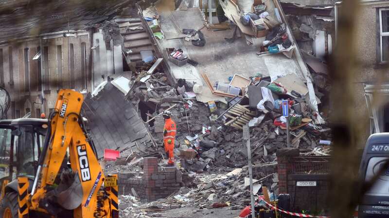 Emergency services at the scene of a house explosion in Swansea, Wales (Image: WalesOnline/Rob Browne)