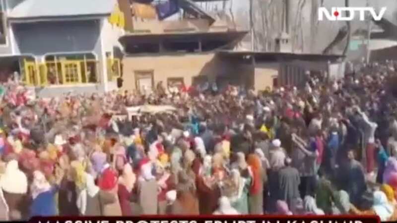 Hundreds of people have turned out to protest after the missing woman
