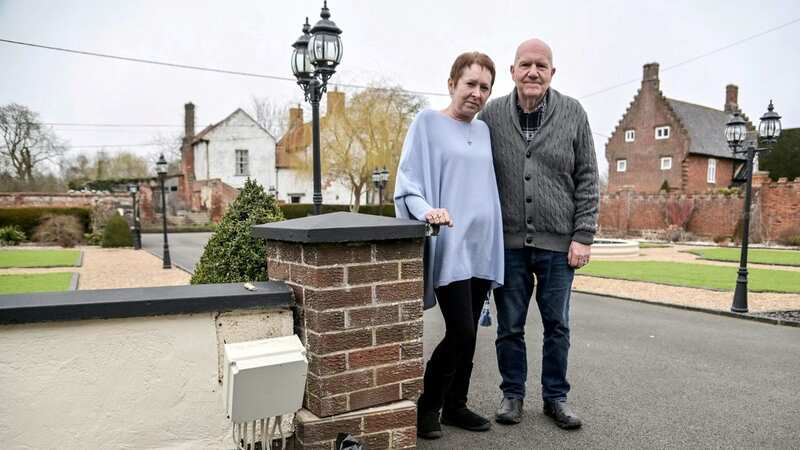 Stan and Sharon have been left to foot the enormous bill after a Morrisons van hit the front pillar of their garden, cutting off electricity to their fountain (Image: Eastern Daily Press / SWNS)