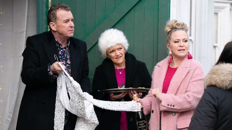 EastEnders is set to revisit the mounting wedding dresses on Albert Square (Image: BBC/Jack Barnes/Kieron McCarron)