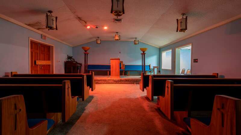 A dark chapel with a narrow ceiling retains the memories of sorrow and mourning (Image: mediadrumimages/LelandKent)