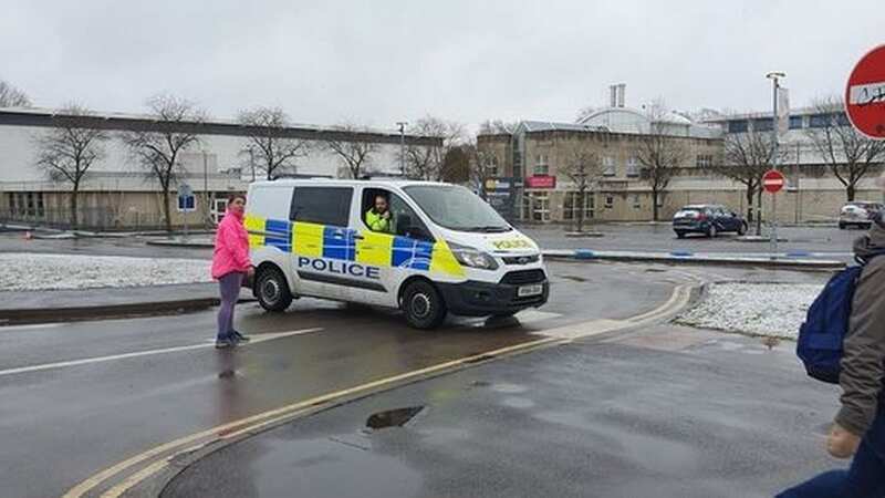 Police vehicles seen at Leisure At Cheltenham following the attack (Image: BPM MEDIA)