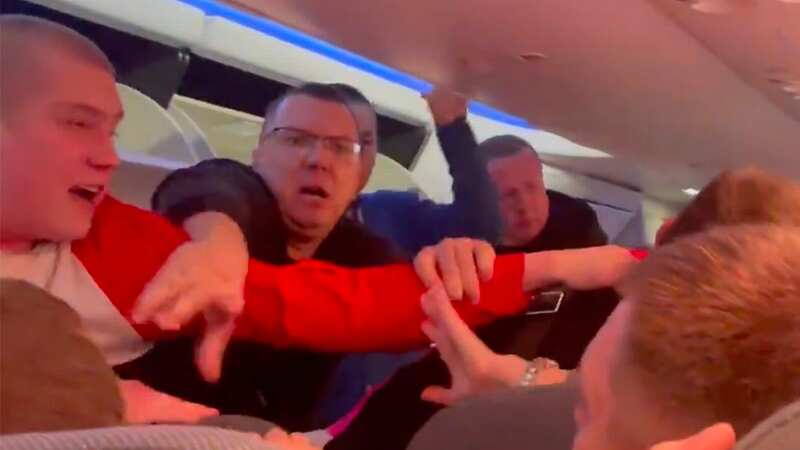 Thugs throw punches in mass brawl on flight as kids scream in terror
