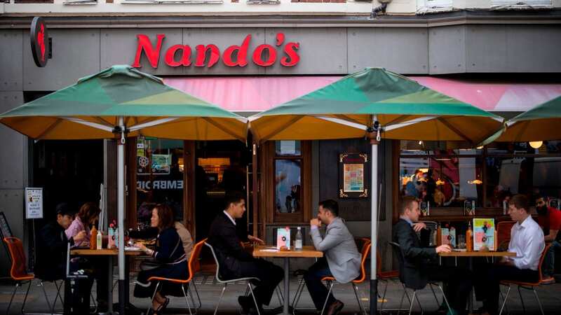 Like many other companies, Nandos said that it "worked hard" to absorb the current rising costs (Image: AFP via Getty Images)