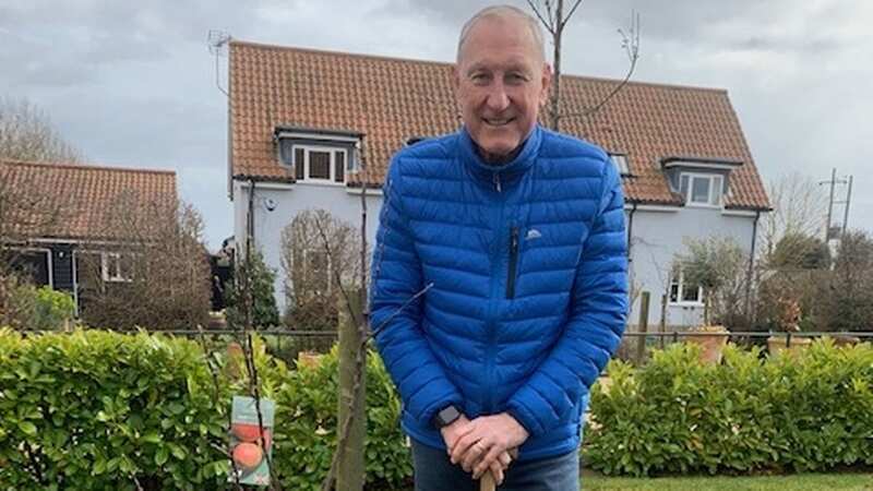 Terry Butcher with the tree he planted in honour of the late Queen (Image: Twitter / QGCanopy)
