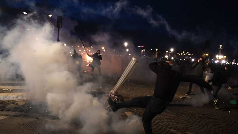 Rioters have set fire to vehicles in protest of the new bill (Image: AFP via Getty Images)