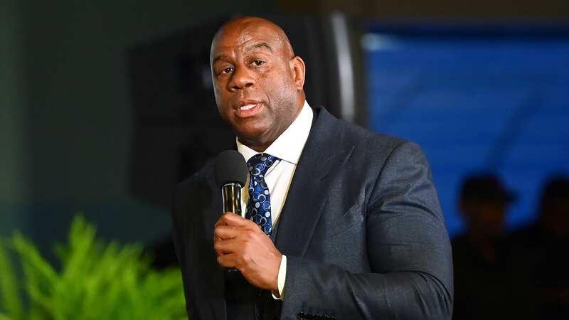 Magic Johnson is part of a group hoping to rival Amazon supremo Jeff Bezos for the Washington Commanders (Image: Getty)