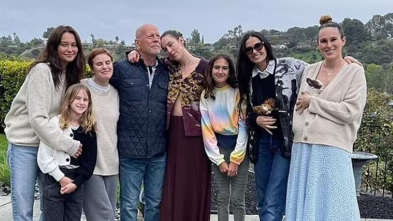 Bruce Willis is seen with all five of his daughters as well as his ex-wife Demi Moore and current wife Emma during his 68th birthday celebration (Image: Instagram)