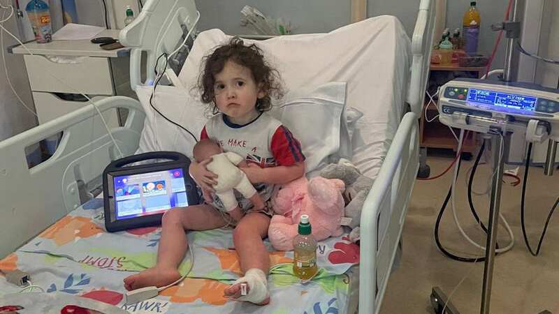 Evie needs to remain in hospital until she can get a transplant (Image: Chloe Green / SWNS)