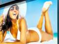 Tanning salon boss ordered to take down 'offensive' picture of woman in a bikini eiqrqiquuideinv